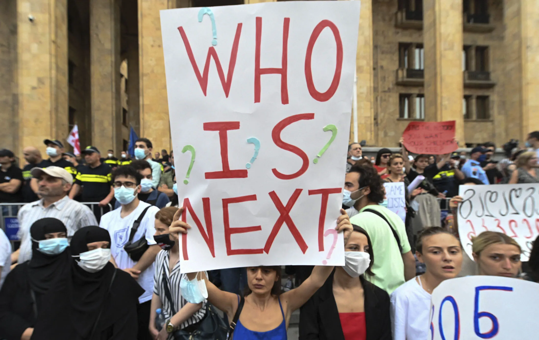 A protester&nbsp;holds up a sign&nbsp;during a rally in Tbilisi,&nbsp;on July 11.