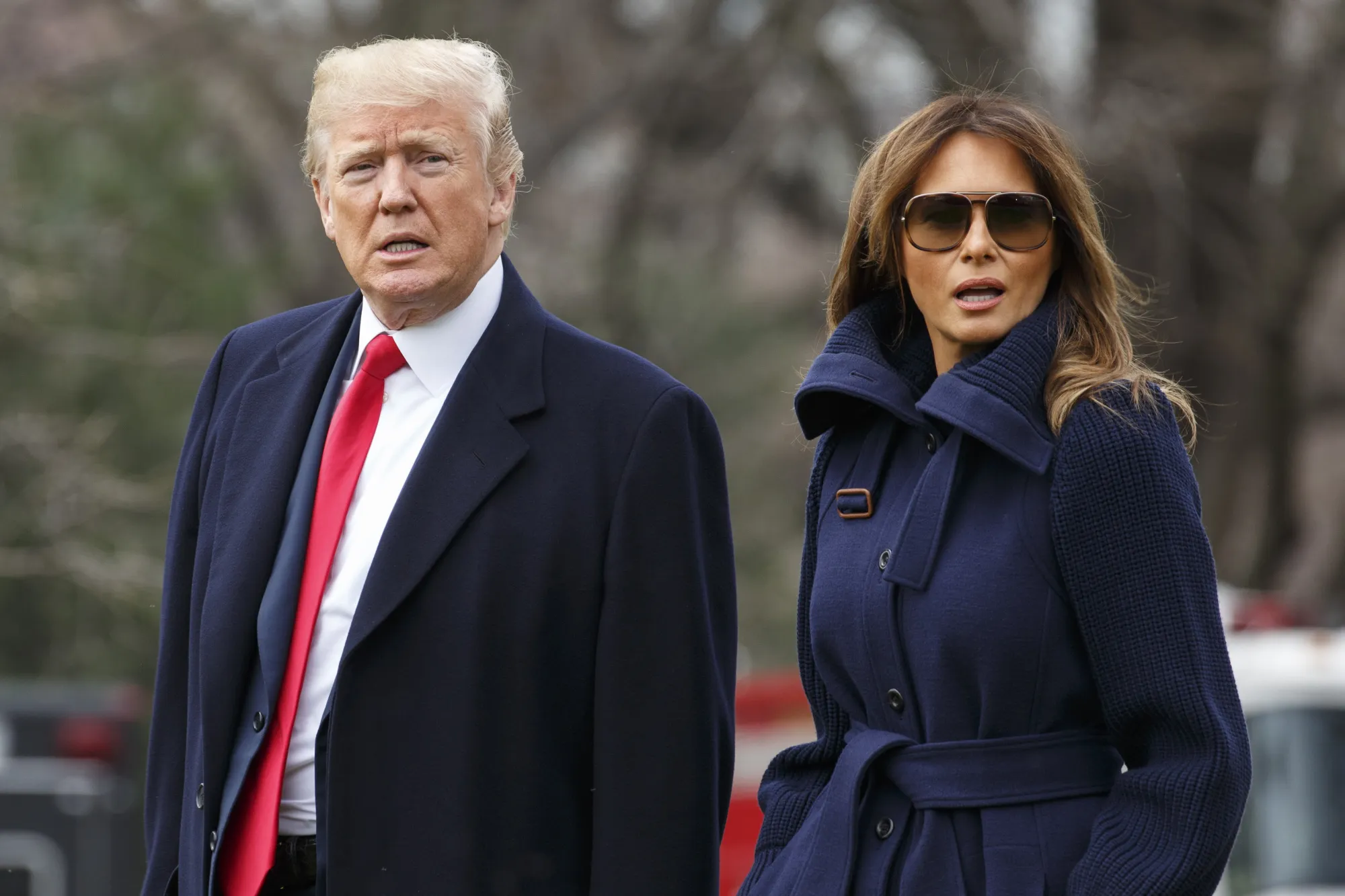 President Donald Trump and&nbsp;First Lady Melania Trump walk on the South Lawn of the White House.