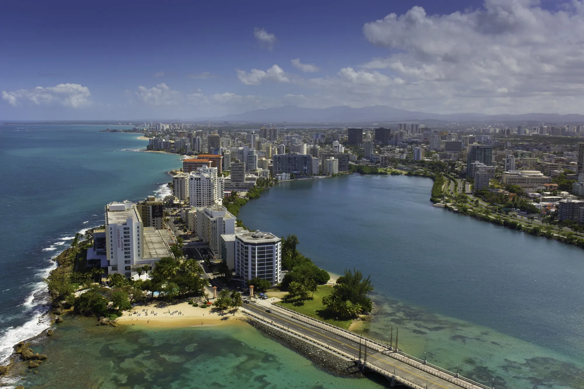 Hotels line Condado Lagoon and the Atlantic Ocean in San Juan, Puerto Rico