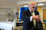 Boris Johnson during a visit to South West London Orthopaedic Centre in Epsom in London, on Aug. 26.