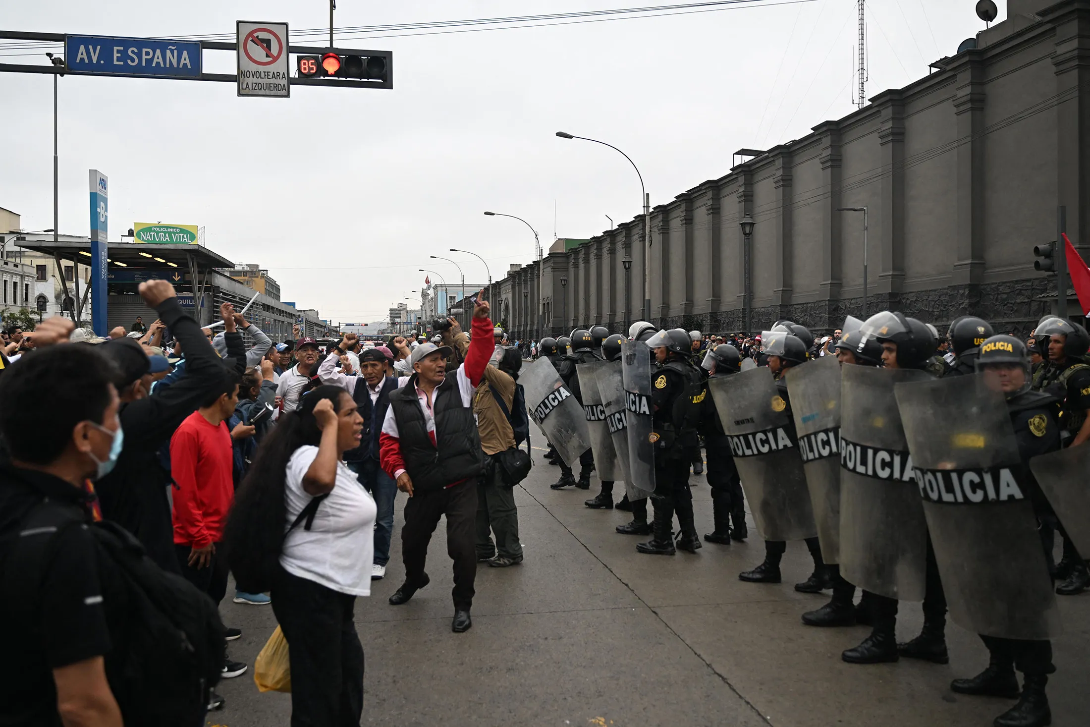 Supporters of Peruvian President Pedro Castillo protest outside the Lima Prefecture following his impeachment in Lima, on Dec. 7.