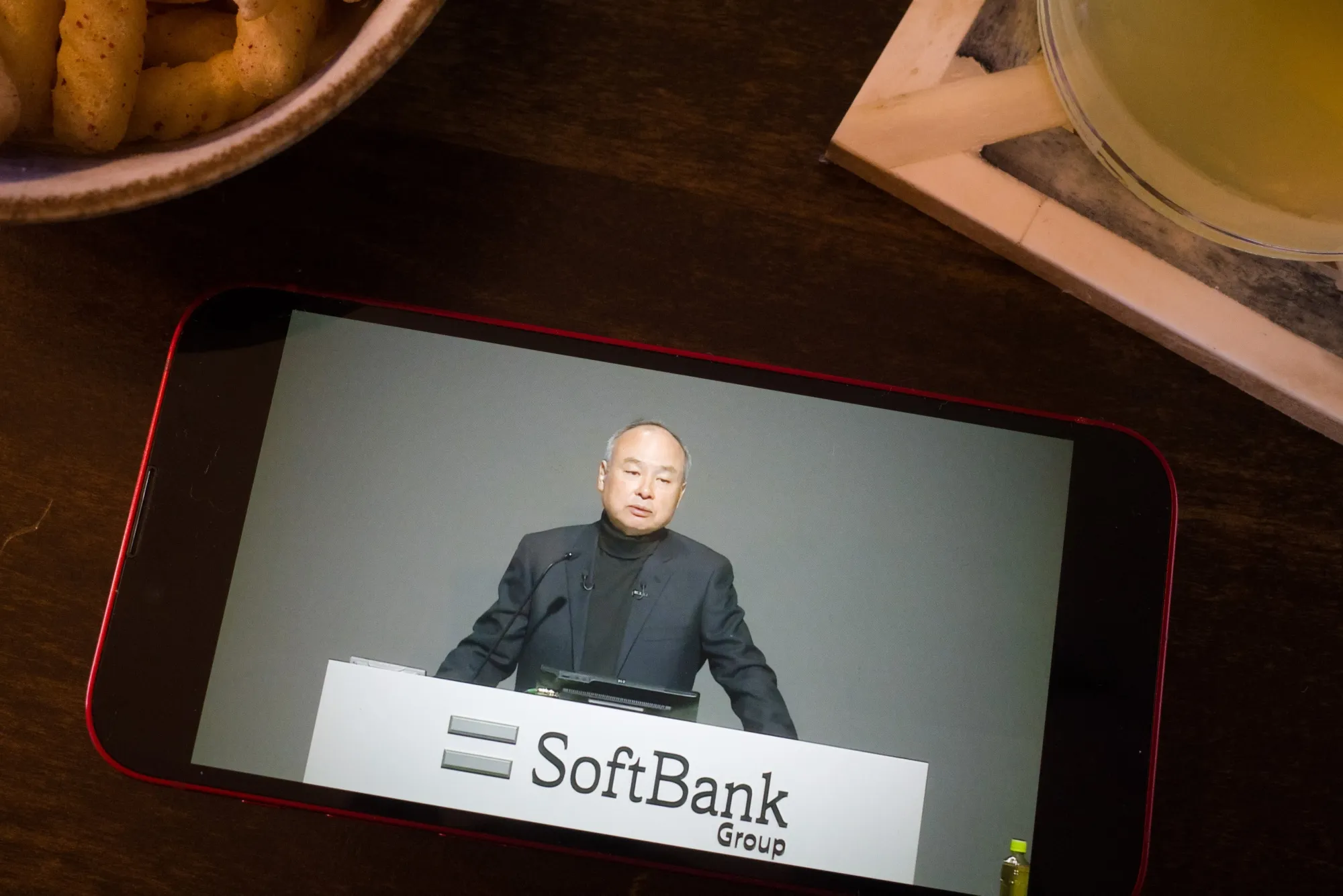Masayoshi Son, chairman and chief executive officer of SoftBank Group Corp., speaking in Tokyo during a virtual earnings announcement, arranged in Naha, Japan, on Tuesday, Feb. 8, 2022. SoftBank Group said it plans an initial public offering for Arm Ltd. after Nvidia Corp. abandoned a proposed acquisition of the chip designer in the face of fierce opposition from regulators and customers.