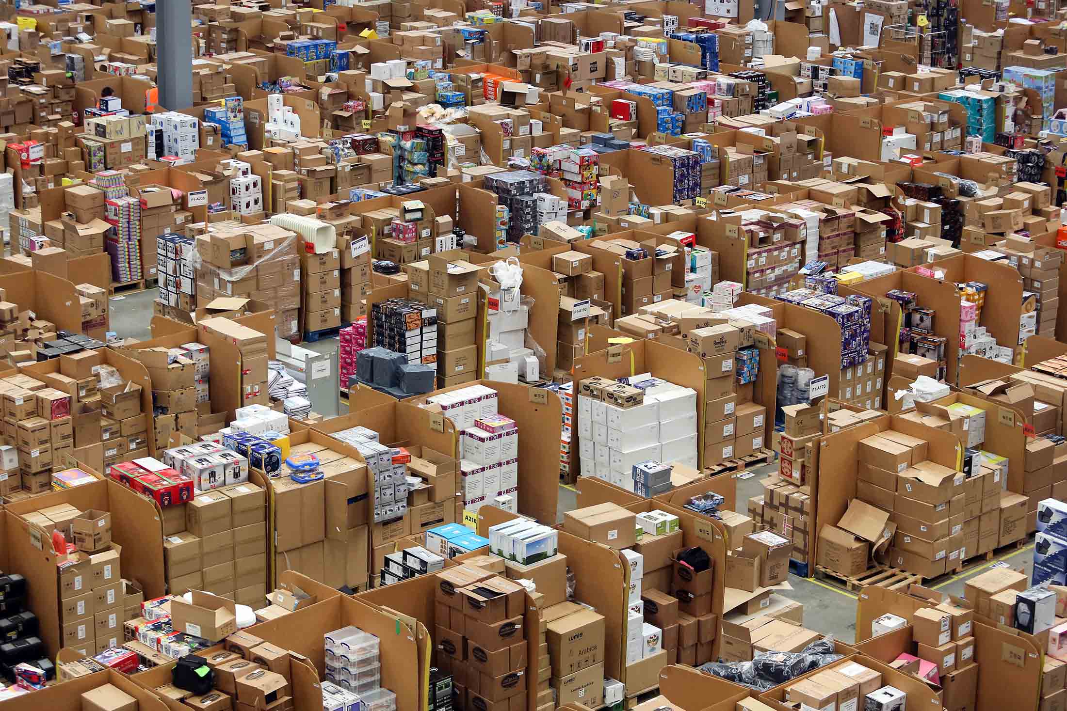 Goods stand stacked at the Amazon.com Inc. fulfillment center in Hemel Hempstead, U.K.
