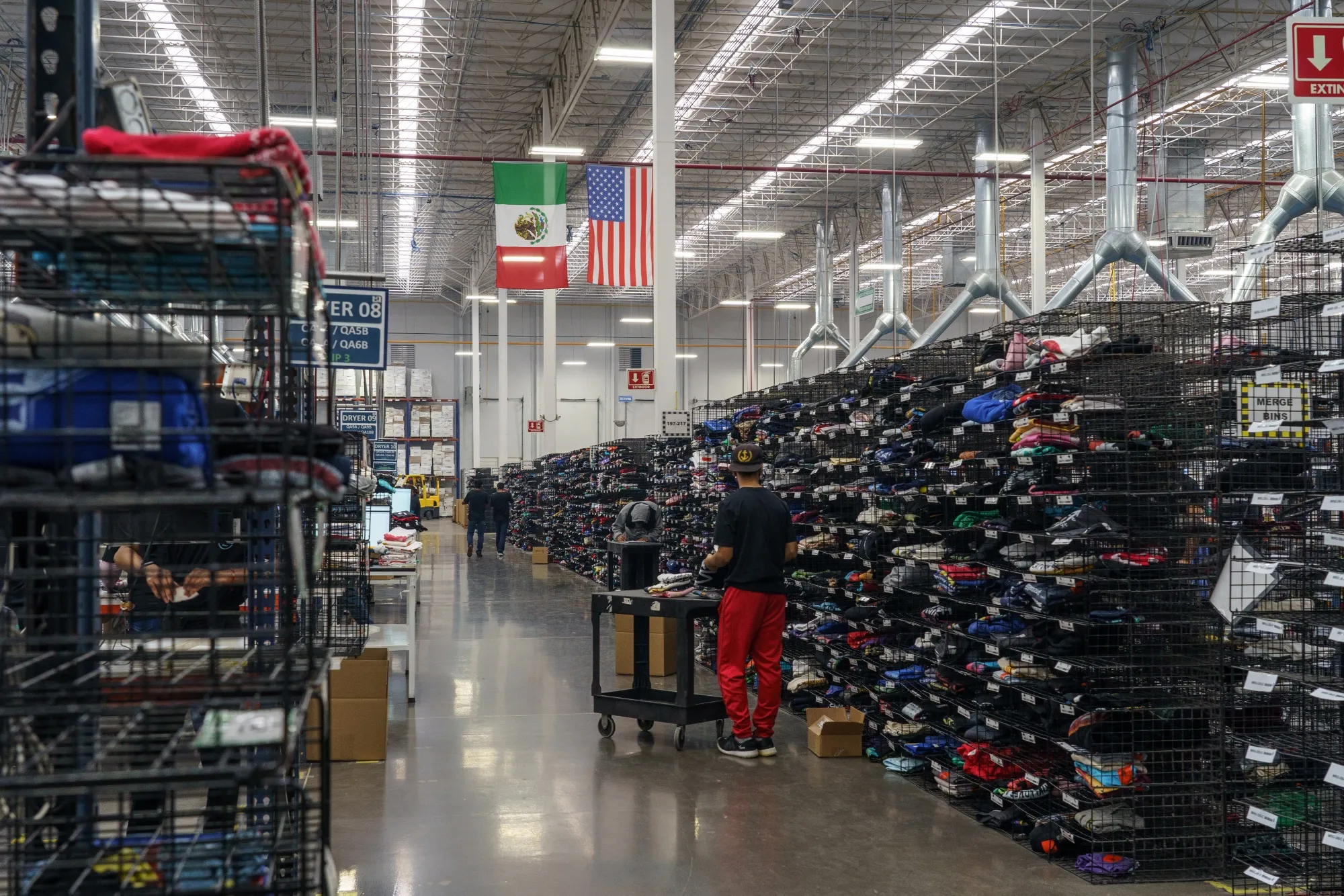 Workers at a warehouse along the US-Mexico border in Ciudad Juarez, Mexico.