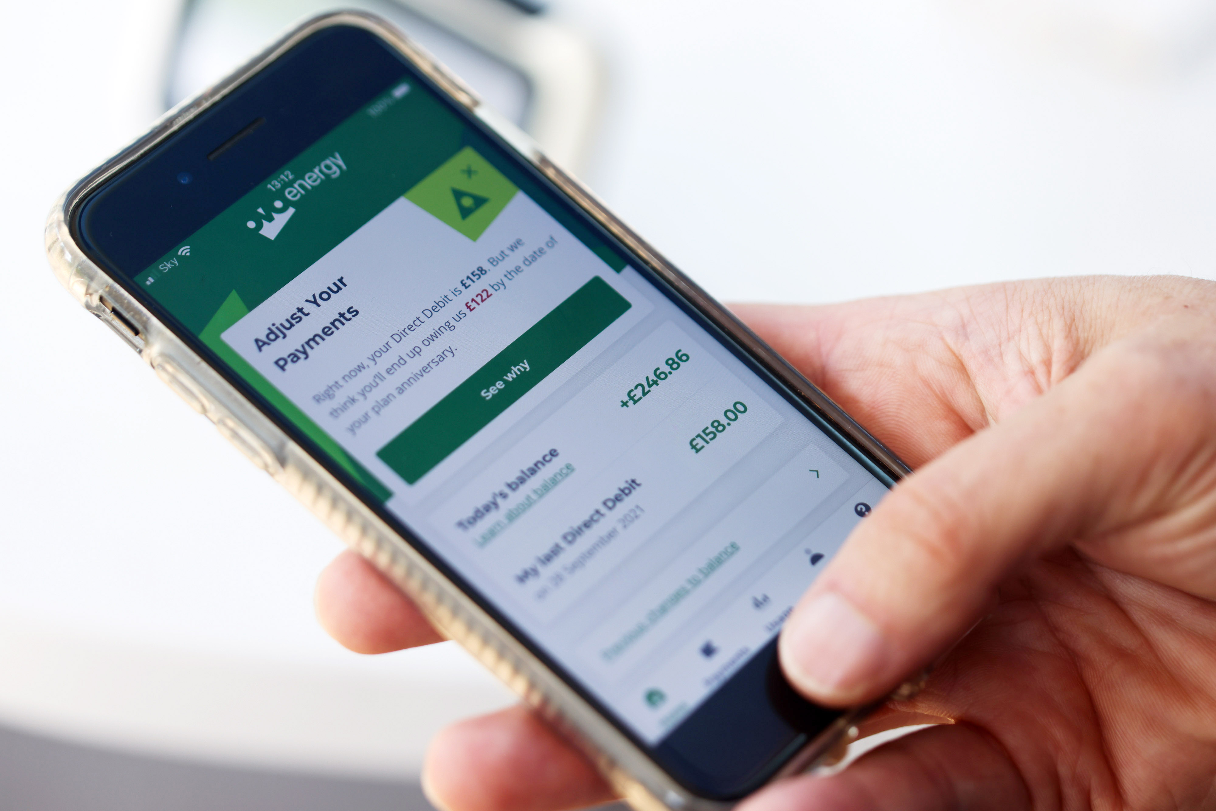 A customer checks their payments on the OVO Energy Ltd. app on a smartphone arranged in Danbury, U.K., on Thursday, Oct. 21, 2021. European energy prices soared to fresh records amid worsening fears over supply, with U.K. natural gas futures exceeding the threshold of 300 pence a therm for the first time ever.