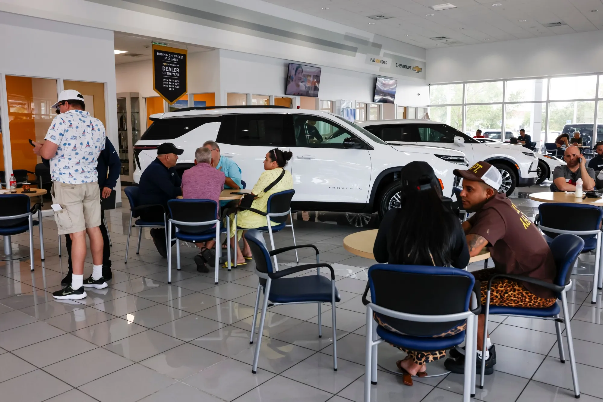 Customers wait at a General Motors Co. Chevrolet dealership in Miami.&nbsp;