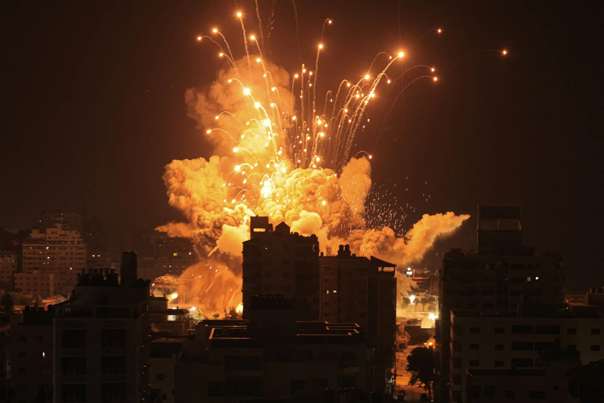 A missile explodes in Gaza City during an Israeli air strike on Oct.&nbsp;8.