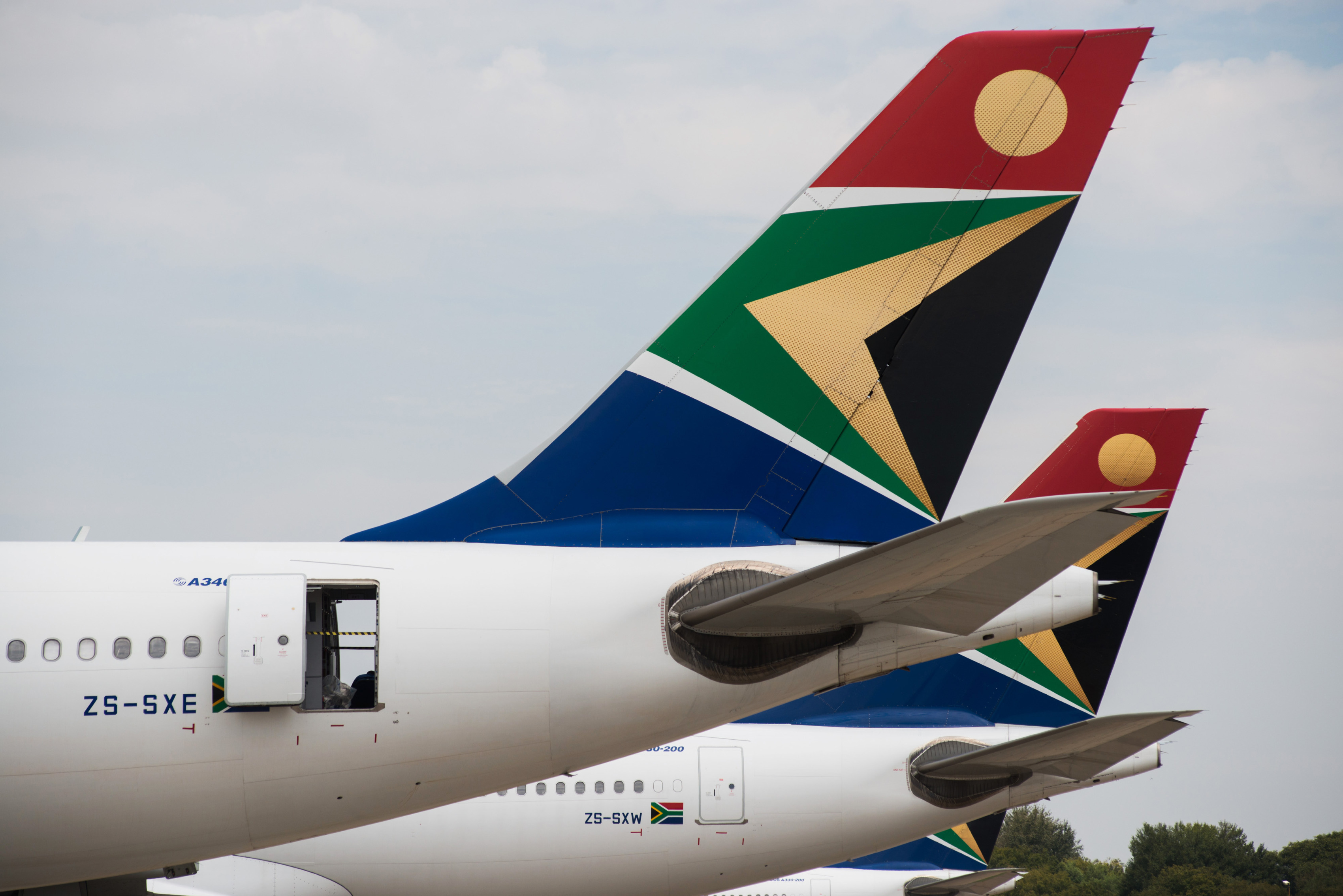 The logo of South African Airways sits on the tailfins of aircraft in Johannesburg, South Africa.