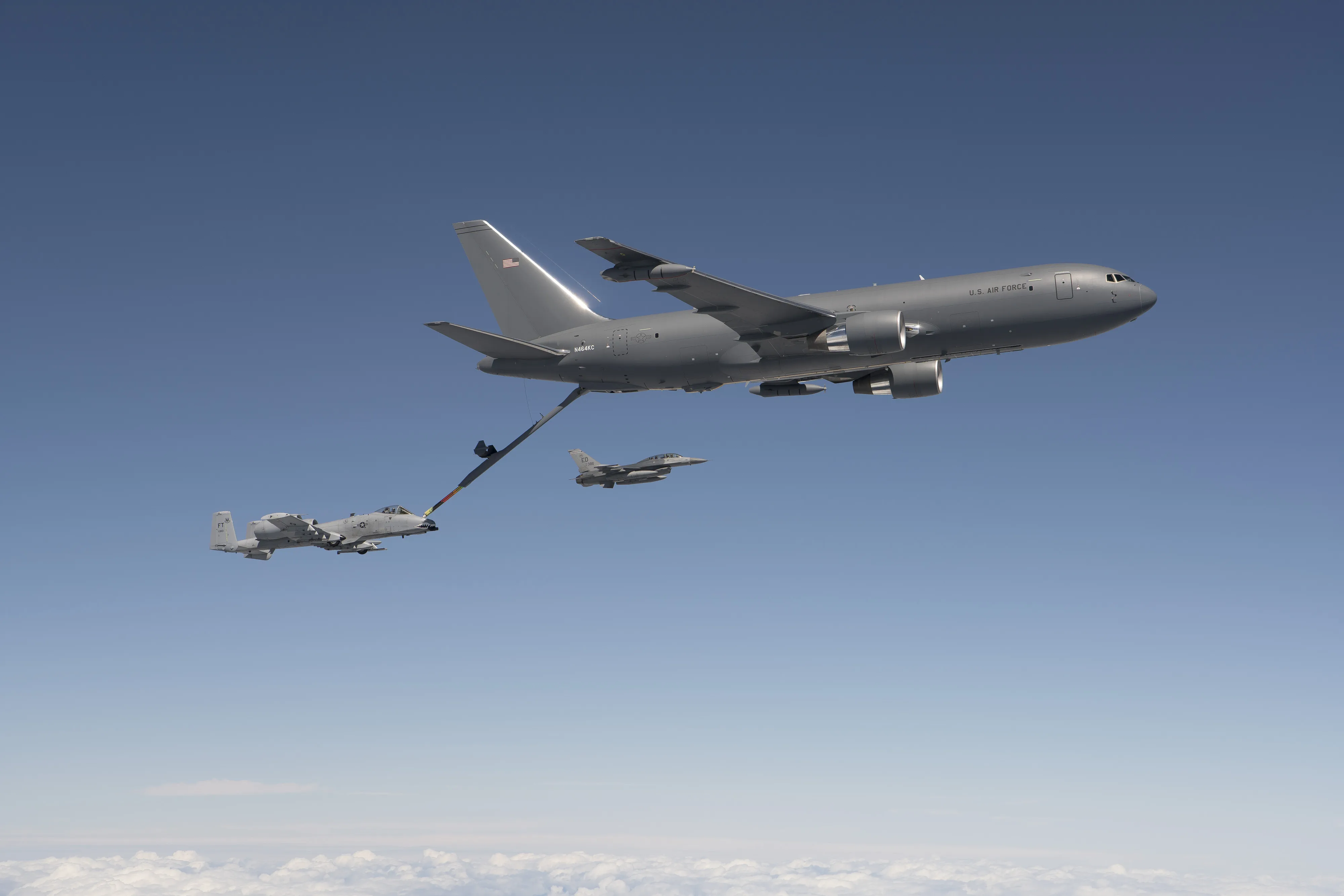 A KC-46 tanker refuels an A-10 aircraft during testing.