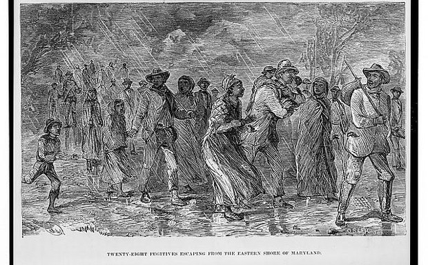 A 1872 wood engraving depicting &quot;fugitive&quot; slaves.