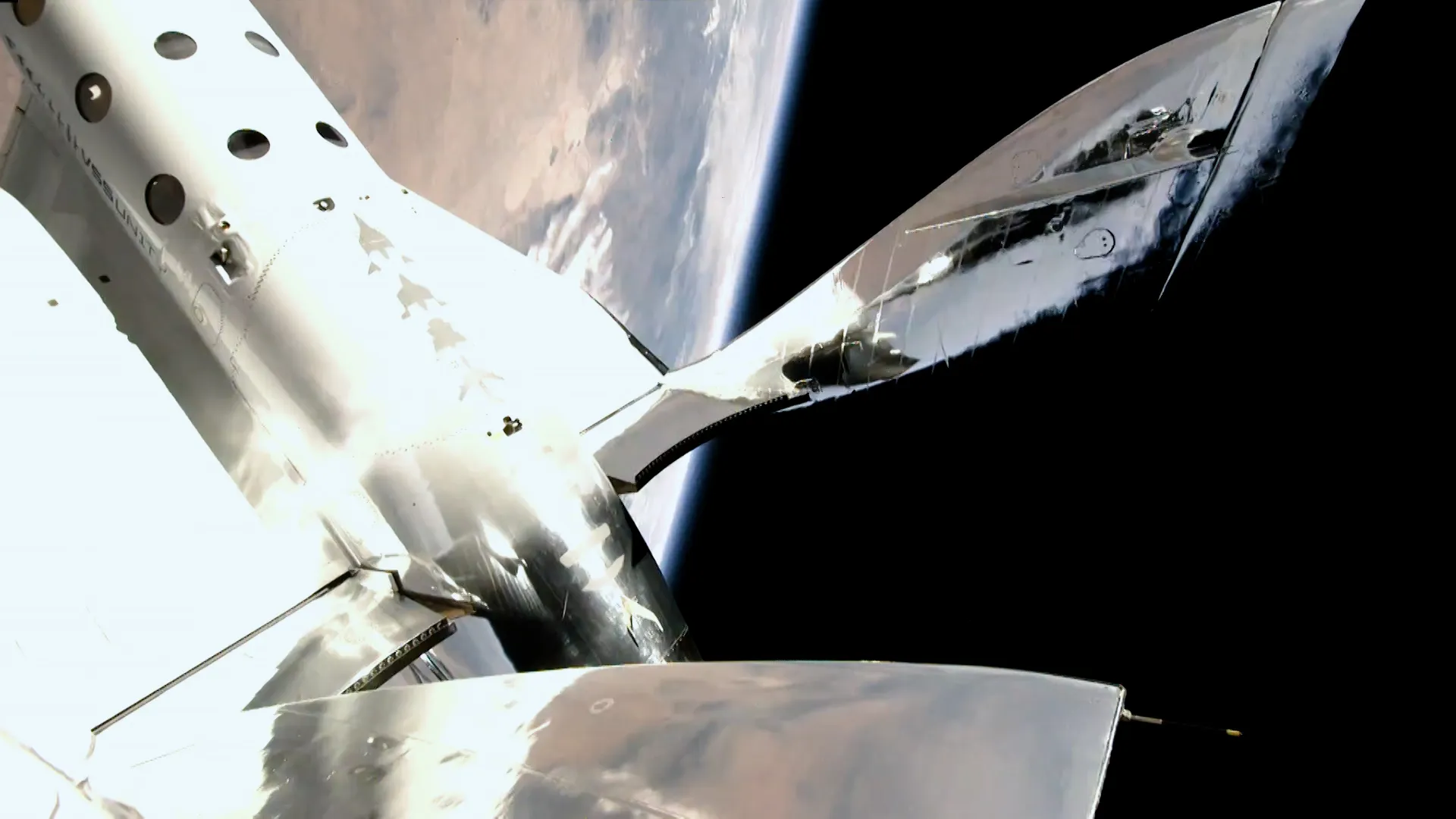 The Virgin Galactic VSS Unity spaceplane in space.