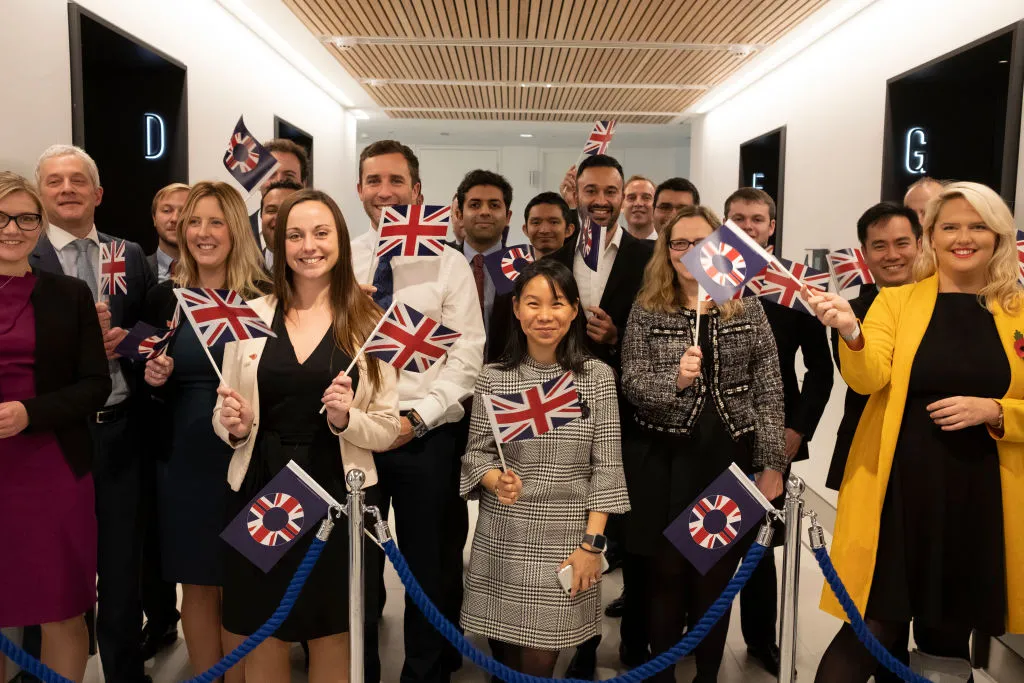 Schroders staff back in 2018. The firm will be flying a different flag in future.