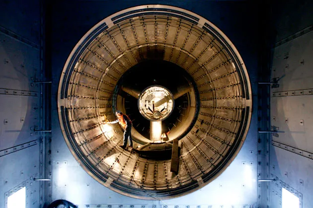 Project engineer Stephen Eley surveys the exhaust duct of the gas turbine at unit one of the Pacific Gas and Electric Colusa Generating Station in Maxwell, Calif.