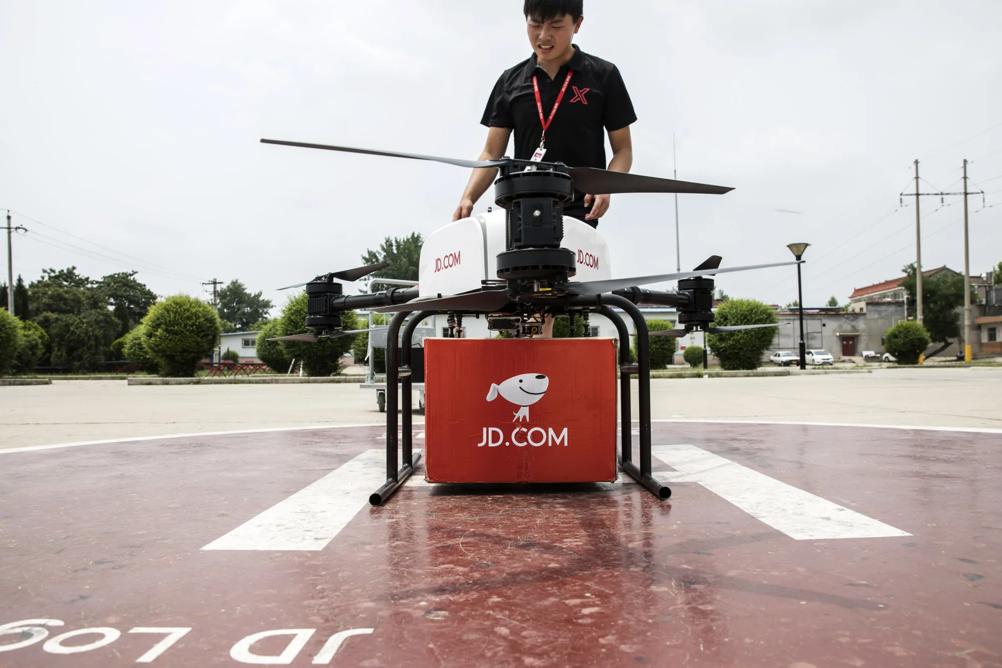 An e JD.com Inc. drone during a package delivery demonstration at a launch pad in Xi'an, China.