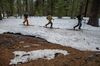 Cross country skiers on melting snow near Donner Summit, in Soda Springs, California, on March 3.