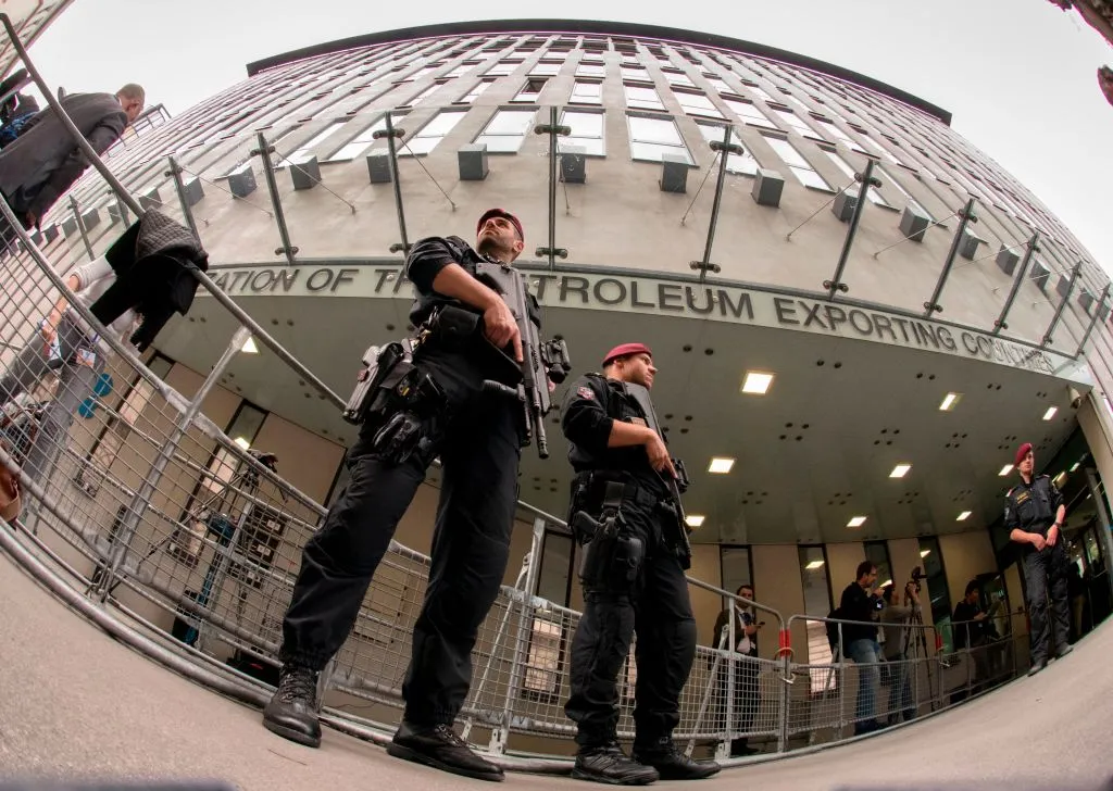 Austrian policemen guard the entrance to OPEC headquarters in Vienna on May 24, 2017.