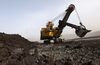 This photo taken on November 15, 2010 shows people working at a coal mine in Huo Lin Guo Le, China's north Inner Mongolia region. China appeared November 19 to soften its stance on a sticking point in UN climate change negotiations, the issue of verifying developing countries' emissions reductions. Beijing does not "believe that increasing transparency will be a problem," at global talks opening later this month in Mexico, said Huang Huikang, the Chinese foreign ministry's representative at the talks. AFP PHOTO / Gou Yige (Photo credit should read GOU YIGE/AFP/Getty Images)