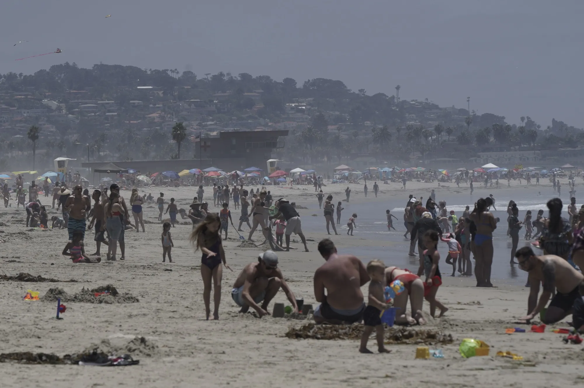 People gather at Mission Beach in San Diego, California, U.S., on&nbsp;July 4.