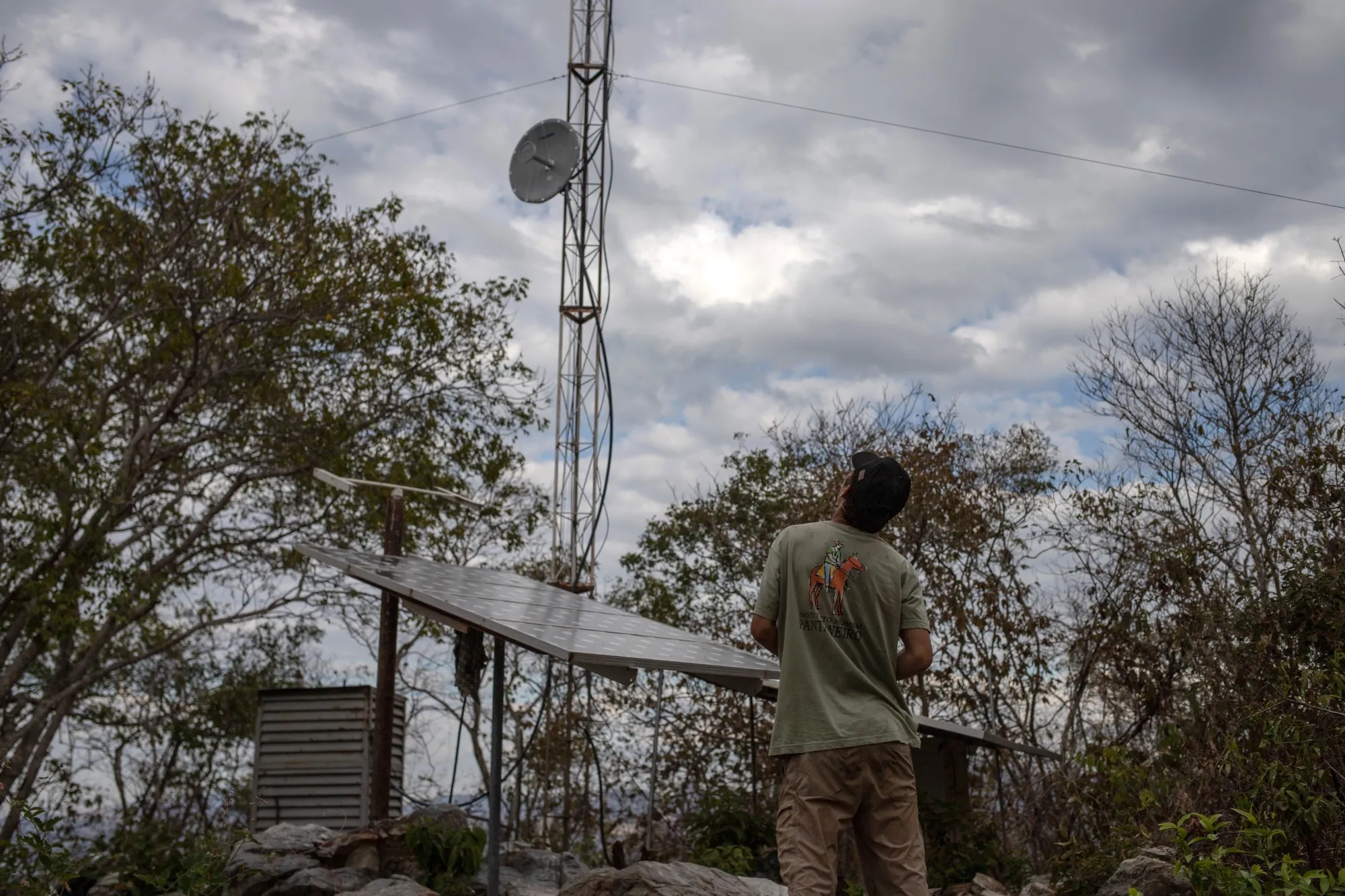 A technician works on a wildfire detection system&nbsp;that monitors protected areas in the Pantanal Wetlands, Mato Grosso do Sul state, Brazil.