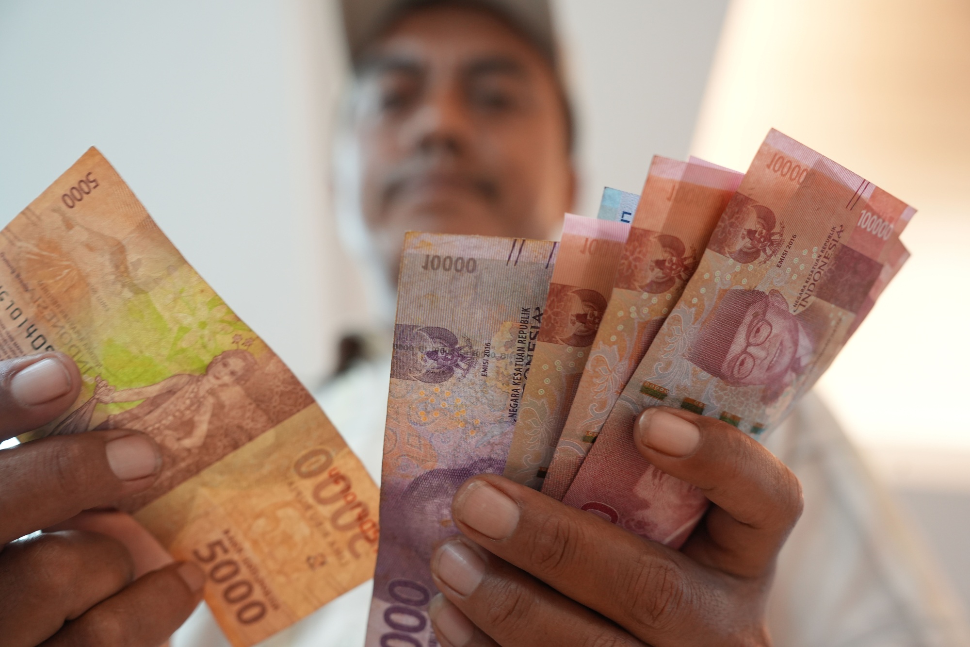 The rupiah rose as much as 0.4% to 16,135 per dollar on Friday.