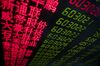 Stock price movements are seen on a screen at a securities company in Beijing on May 6, 2019. - China's key stock indices plunged more five percent on May 6 after US President Donald Trump threatened to hike tariffs on Chinese imports, potentially derailing high-level trade talks as they enter their final phase. (Photo by Nicolas ASFOURI / AFP) (Photo credit should read NICOLAS ASFOURI/AFP/Getty Images)