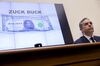 A Zuck Buck is displayed on a monitor as David Marcus, head of blockchain with Facebook Inc., right, is questioned by Representative Brad Sherman, a Democrat from California, not pictured, during a House Financial Services Committee hearing in Washington.