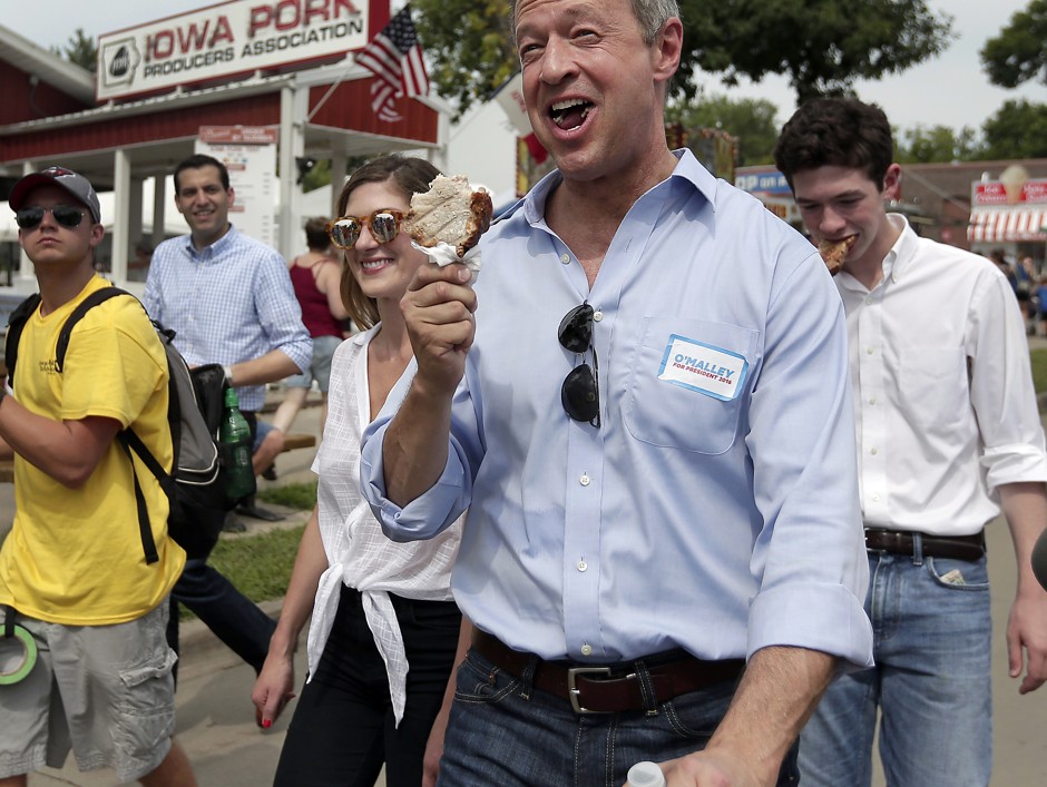 Democratic presidential candidate Martin O'Malley tries Iowa's &quot;pork chop on a stick&quot; at the Iowa State Fair in Des Moines, Iowa.