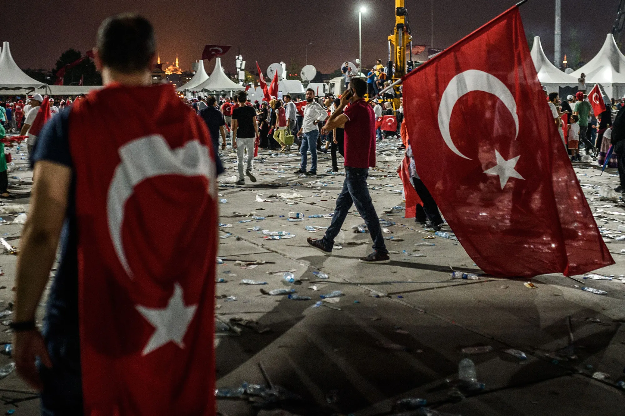 People leave after a rally against a failed military coup on July 15 in Istanbul, on Aug. 7, 2016.
