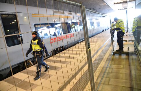 A temporary fence is erected between domestic and international tracks at Hyllie rail station in southern Malmo, Sweden, on Jan. 3, 2016.