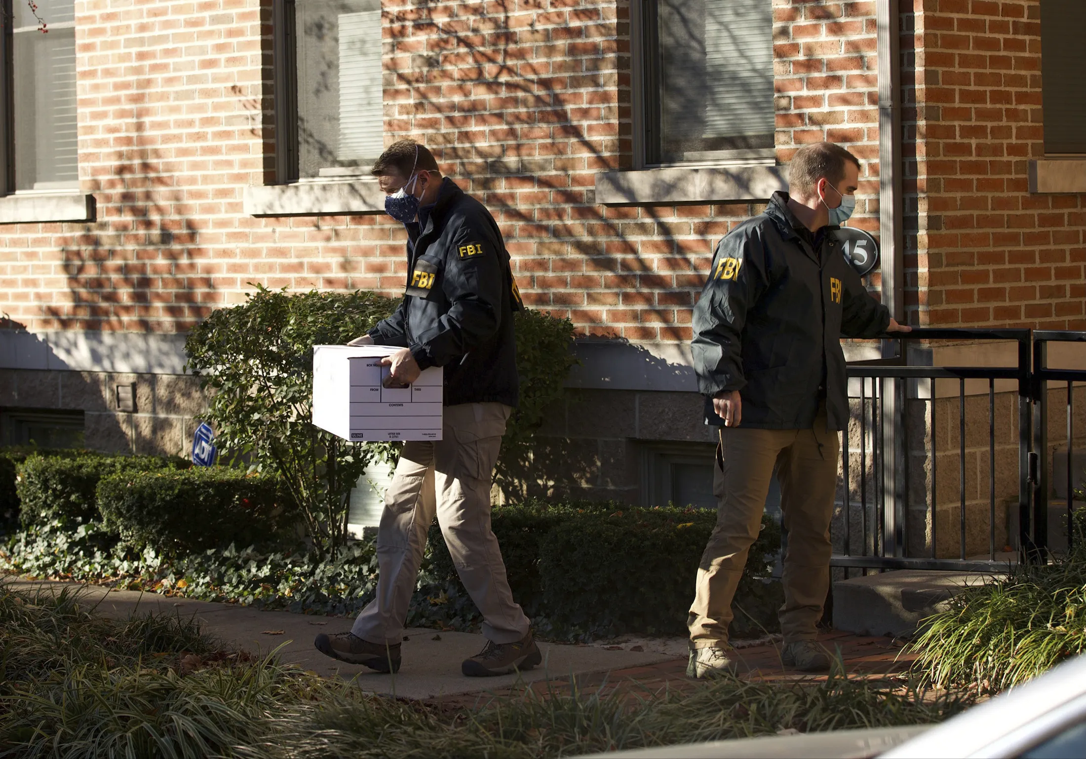 FBI agents remove items from the home of Sam Randazzo&nbsp;in Columbus, Ohio, on&nbsp;Nov. 16.