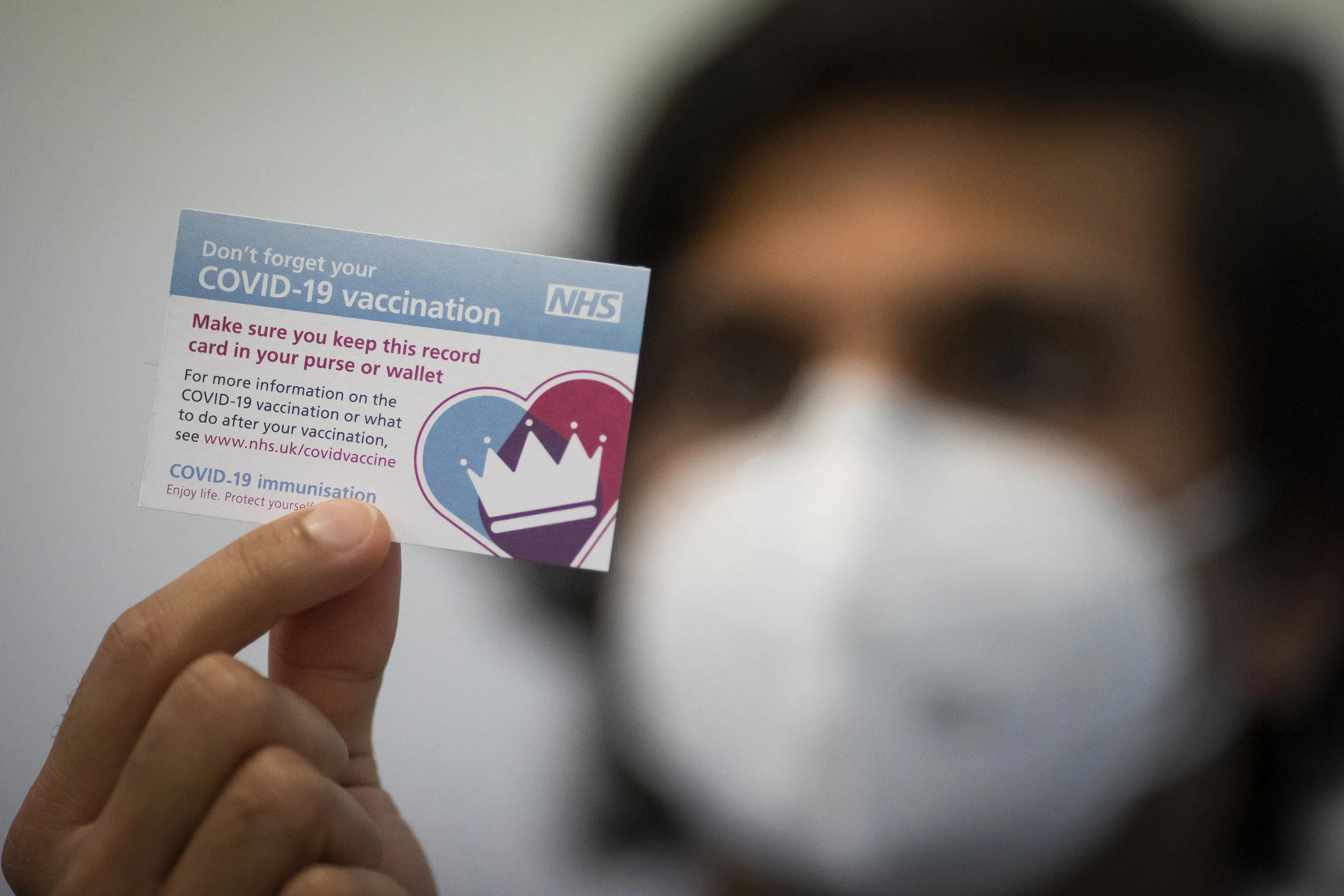 A Covid-19 vaccination card received following&nbsp;a dose of the Pfizer/BioNtech covid-19 vaccine.