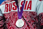 A Russian athlete receives a silver medal at the 2012 London Olympic Games.