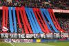 Photo of a fans stand in a football field