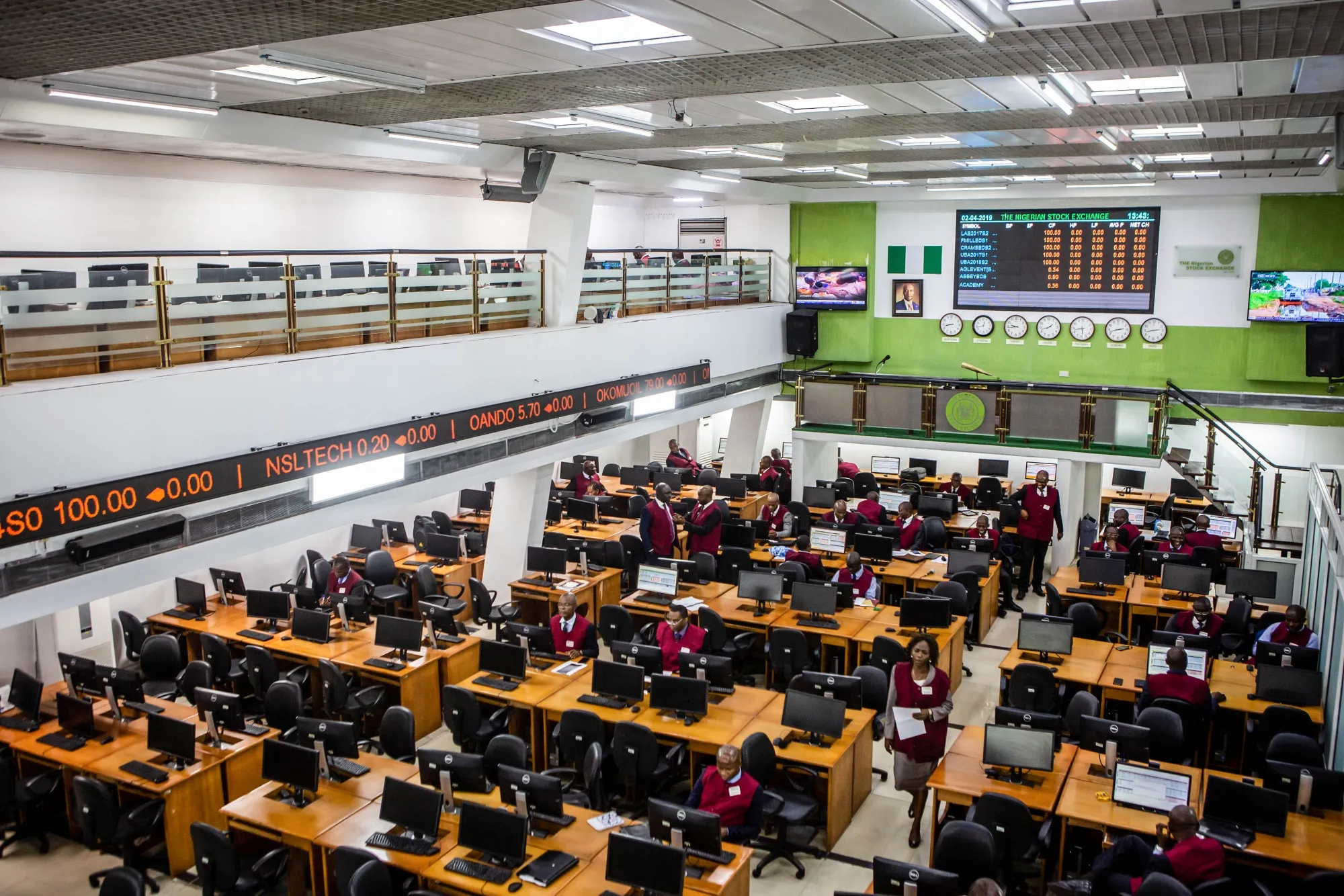 Employees work on the trading floor at the Nigerian Stock Exchange (NSE) in Lagos.