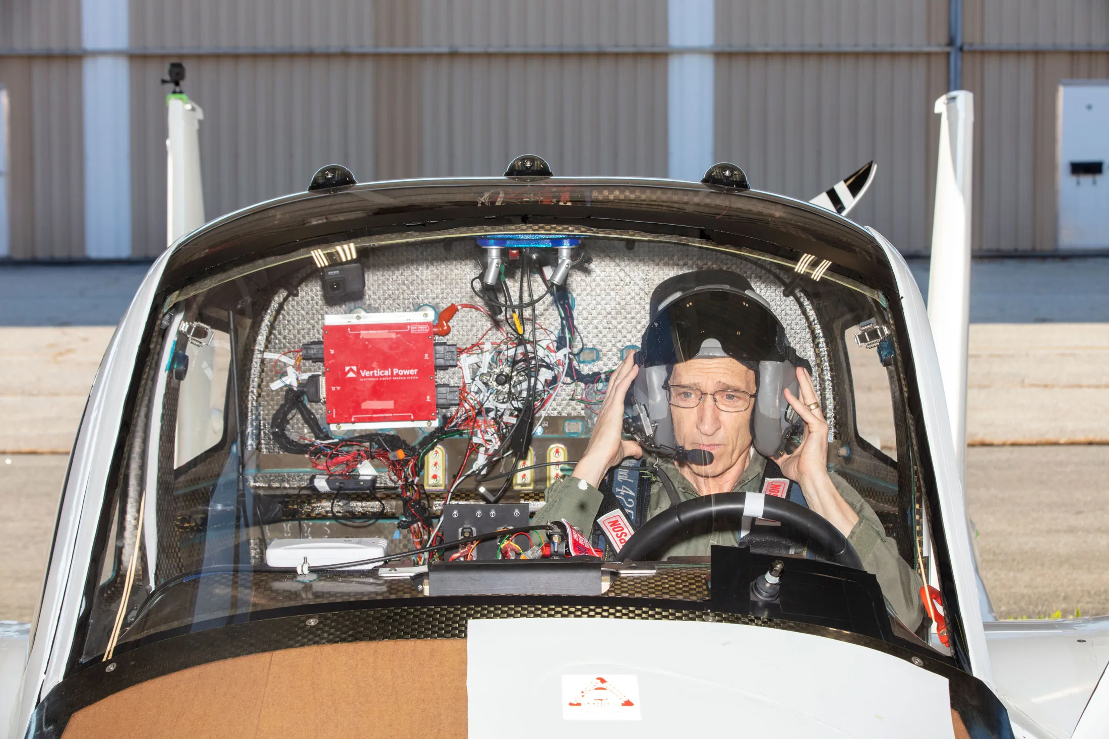 Phil Meteer,&nbsp;Terrafugia’s&nbsp;chief pilot,&nbsp;adjusts his helmet before test flying&nbsp;Transition,&nbsp;the company's flying car&nbsp;or “roadable aircraft,”&nbsp;at&nbsp;New Hampshire’s Nashua Airport.