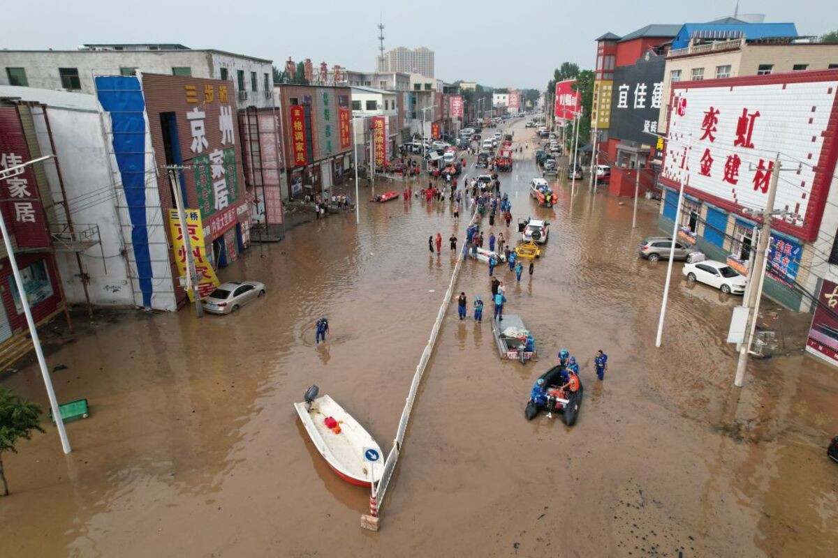 Death Toll Climbs at City Near Beijing in Aftermath of Typhoon - Bloomberg