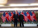 US President Donald Trump poses with North Korea's leader Kim Jong Un before a meeting at the Sofitel Legend Metropole hotel in Hanoi on February 27.