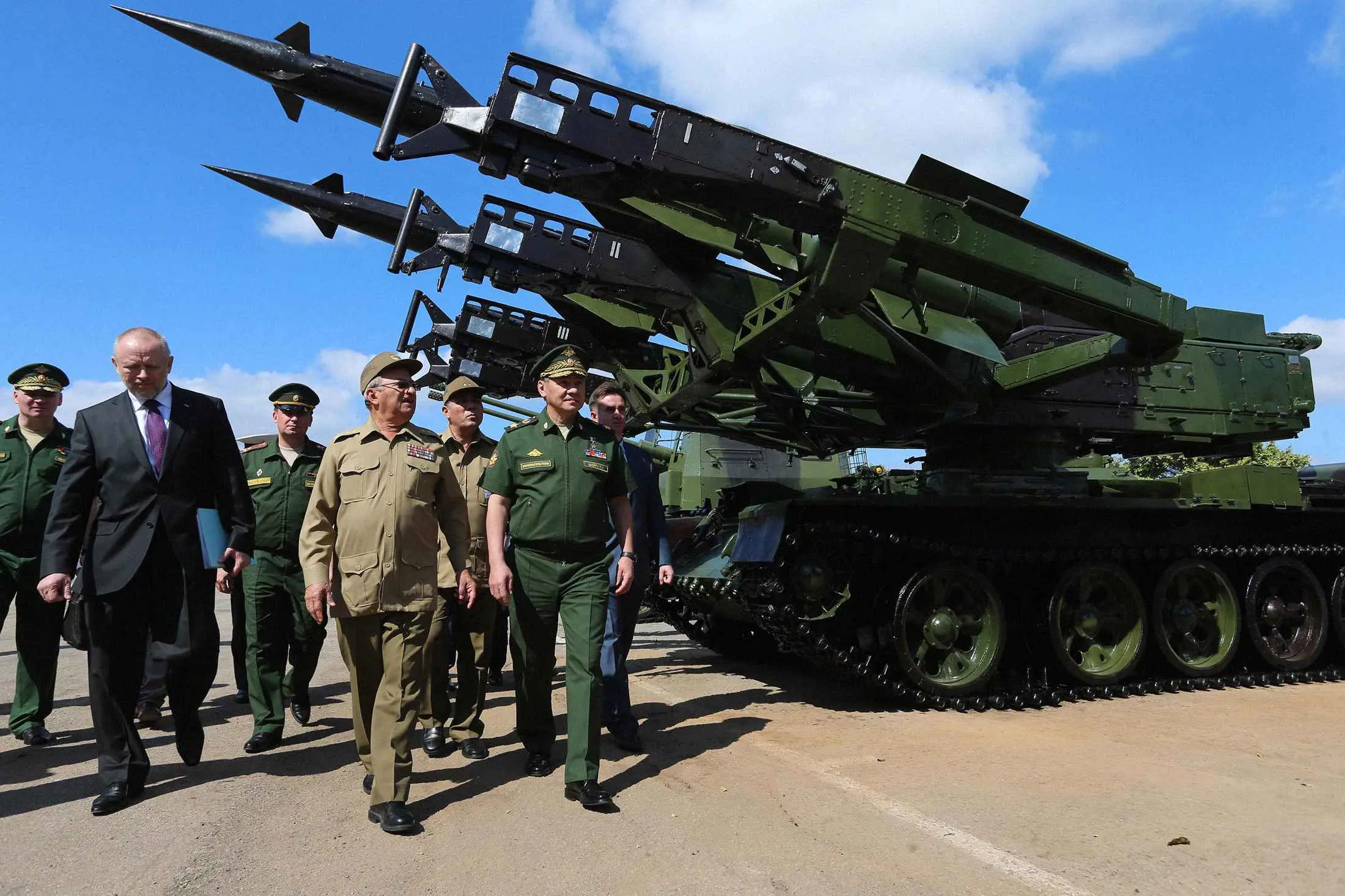 Russian Defense Minister Sergei Shoigu&nbsp;(center) inspects a Cuban tank division during a 2015 visit to Havana.
