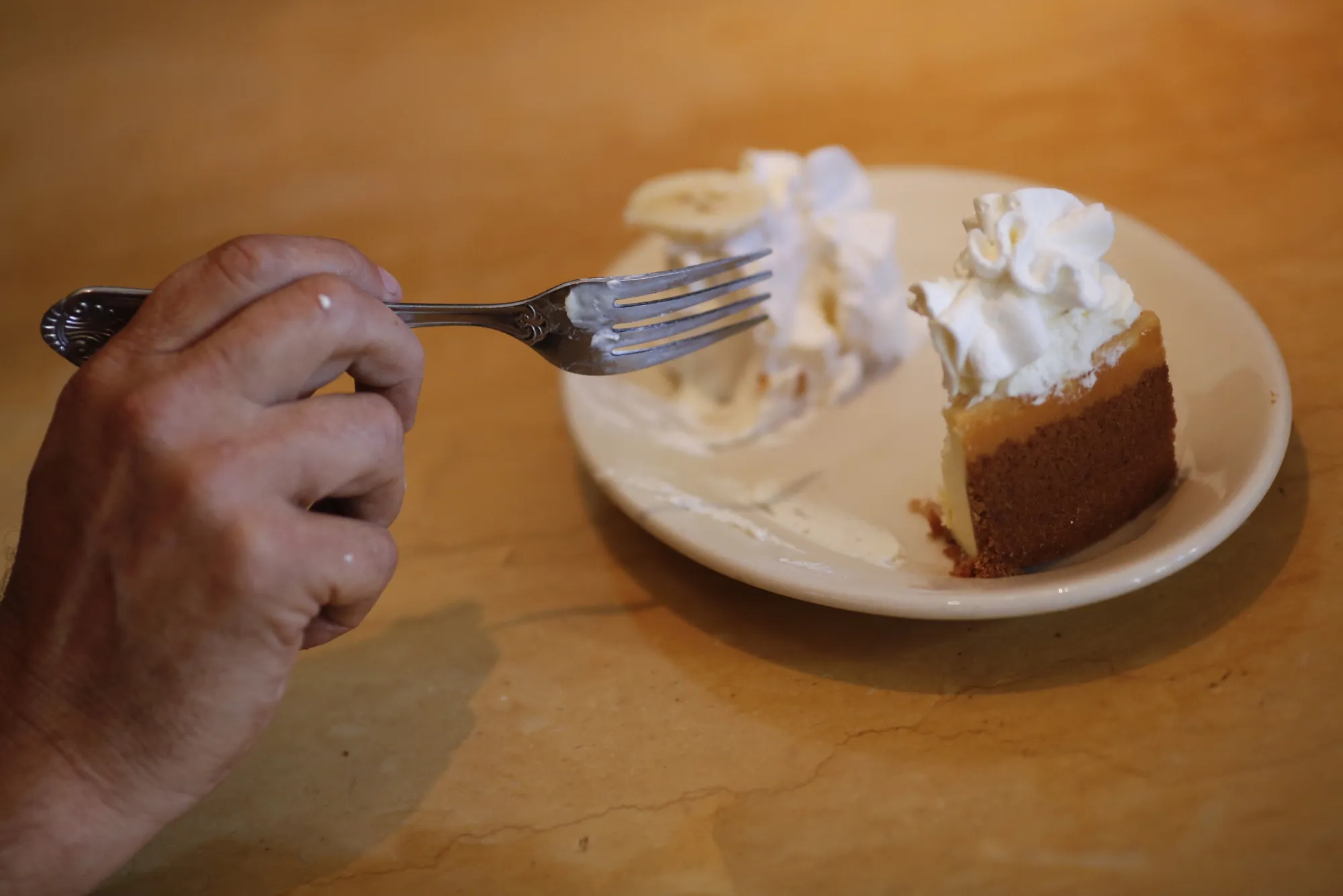 Patrons Dine At The Cheesecake Factory Restaurant In Kentucky
