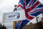 Anti-Brexit protesters demonstrate outside the Houses of Parliament on January 15, 2019 in London, England.