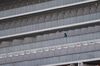 A passenger is seen on the quarantined Diamond Princess cruise ship at the Daikoku Pier on February 21, 2020 in Yokohama, Japan.