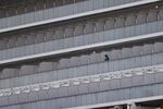 A passenger is seen on the quarantined Diamond Princess cruise ship at the Daikoku Pier on February 21, 2020 in Yokohama, Japan.
