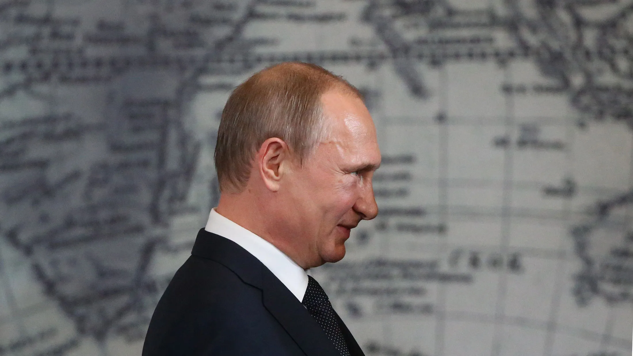 Russian President Vladimir Putin attends a meeting of the Russian Geographical Society’s Board of Trustees on April 27, 2015, in St. Petersburg.
