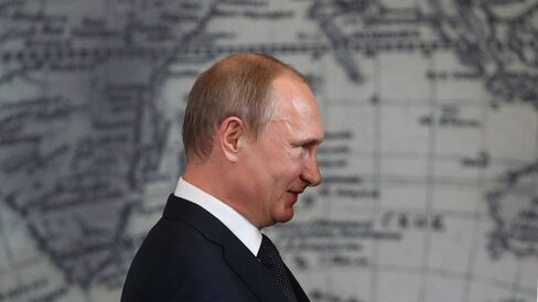 Russian President Vladimir Putin attends a meeting of the Russian Geographical Society’s Board of Trustees on April 27, 2015, in St. Petersburg.