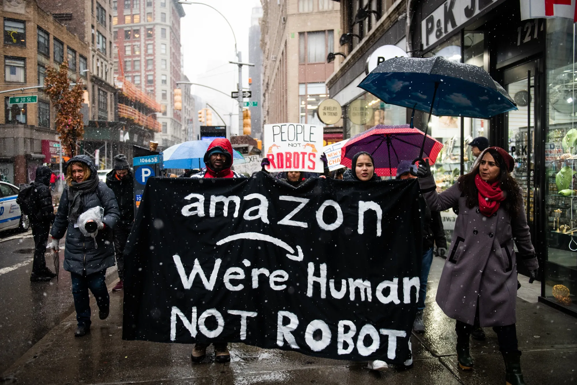 Protesters march towards Bezos’ penthouse in New York, on Dec. 2.