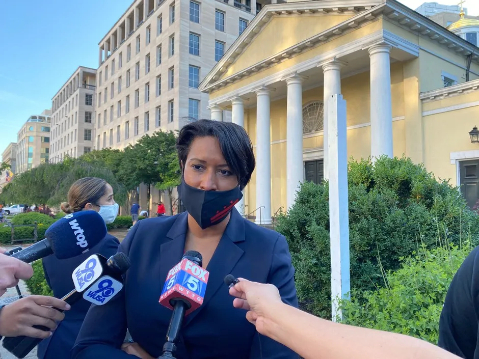 Mayor Muriel Bowser of Washington, D.C., speaks to reporters in front of St. John's Church, which was damaged after a weekend of demonstrations against police violence.