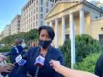 Mayor Muriel Bowser of Washington, D.C., speaks to reporters in front of St. John's Church, which was damaged after a weekend of demonstrations against police violence.