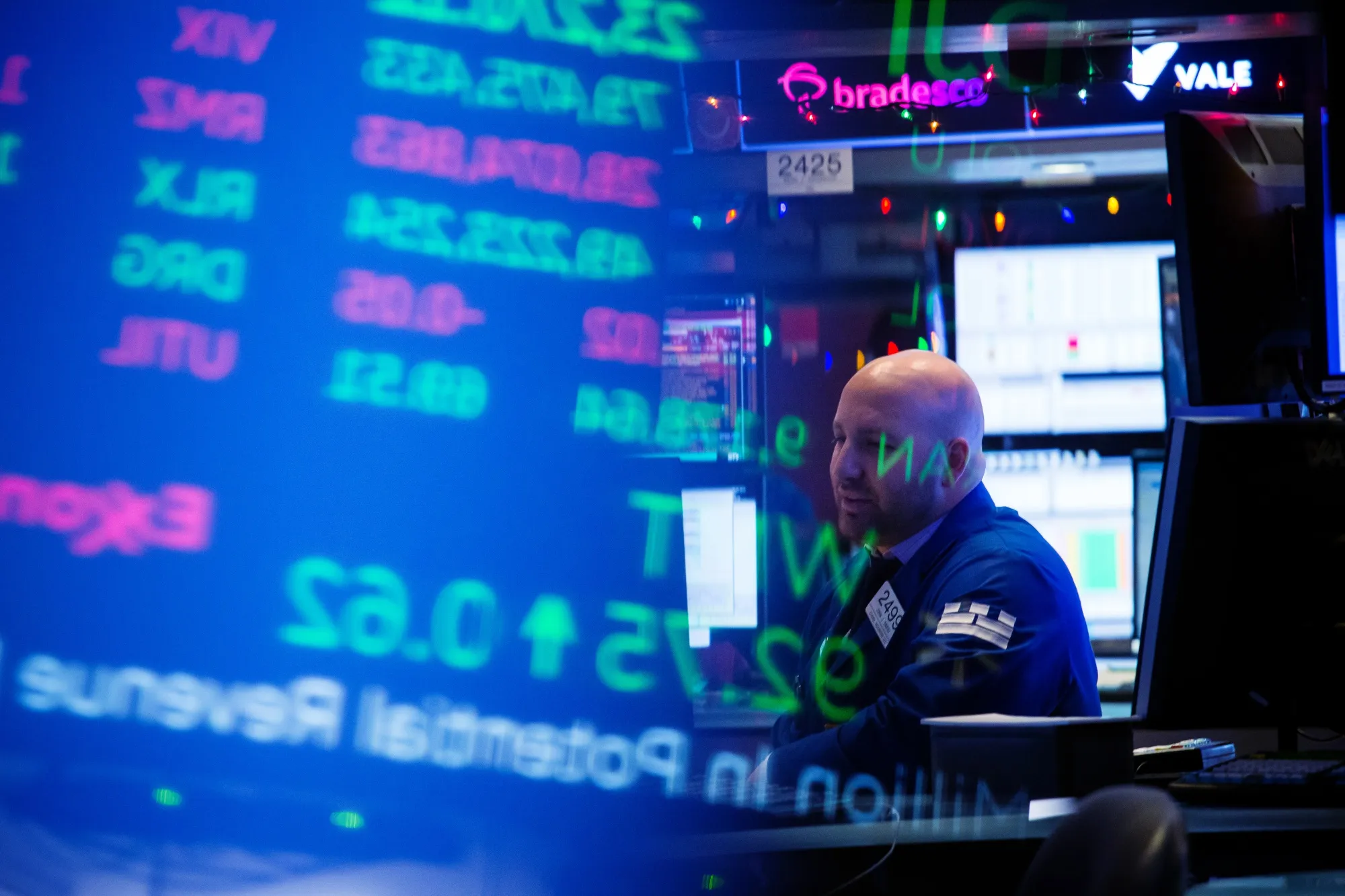 A trader works on the floor of the New York Stock Exchange.