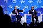 John Kerry, U.S. special presidential envoy for climate, left, and Xie Zhenhua, China's special envoy for climate change, at WEF in Davos, Switzerland.