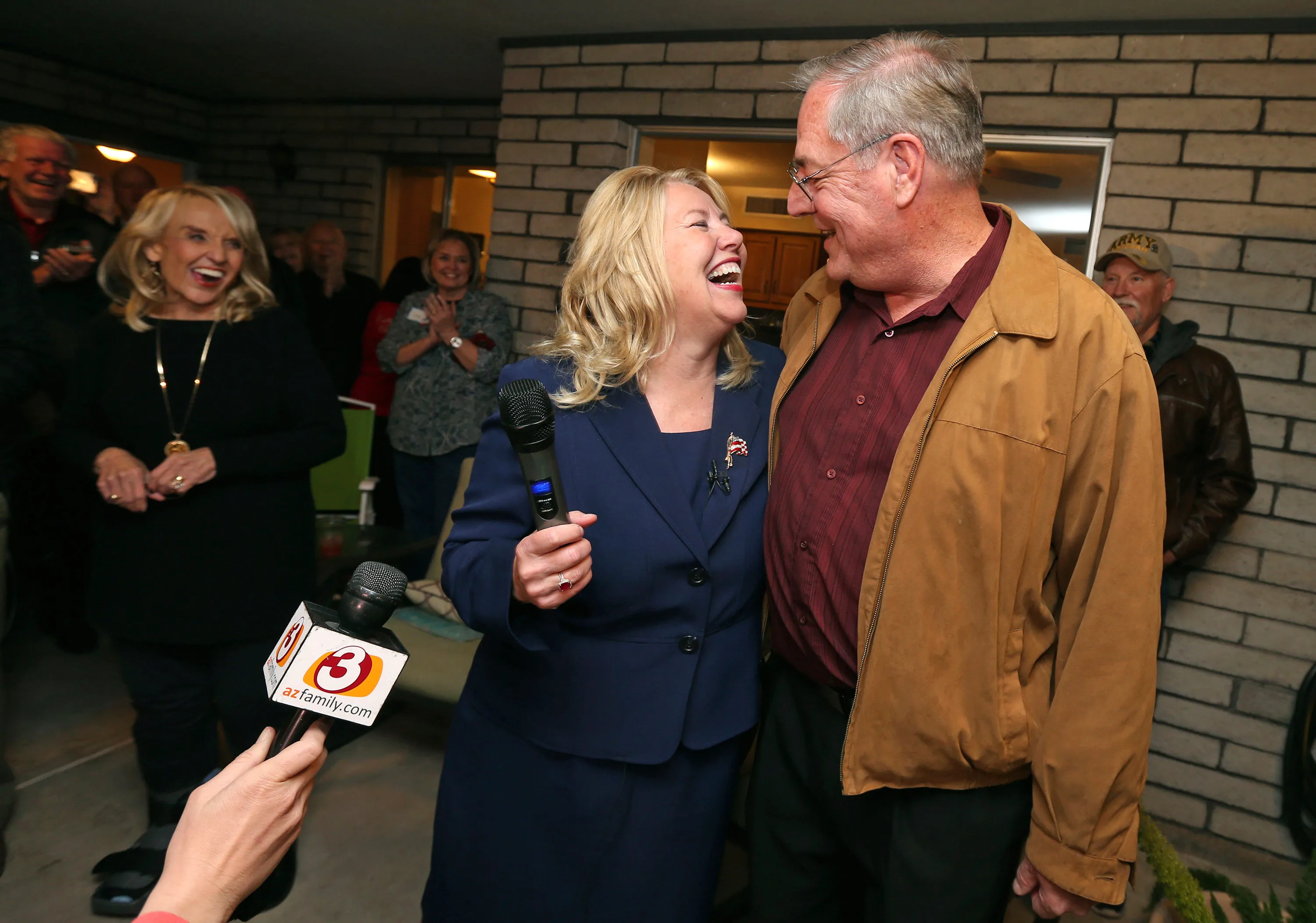 Debbie Lesko celebrates with her husband, Joe, after voting results&nbsp;in Glendale, Arizona, on Feb. 28.